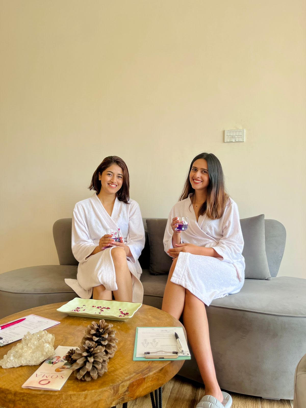 Relaxing in robes with herbal drinks