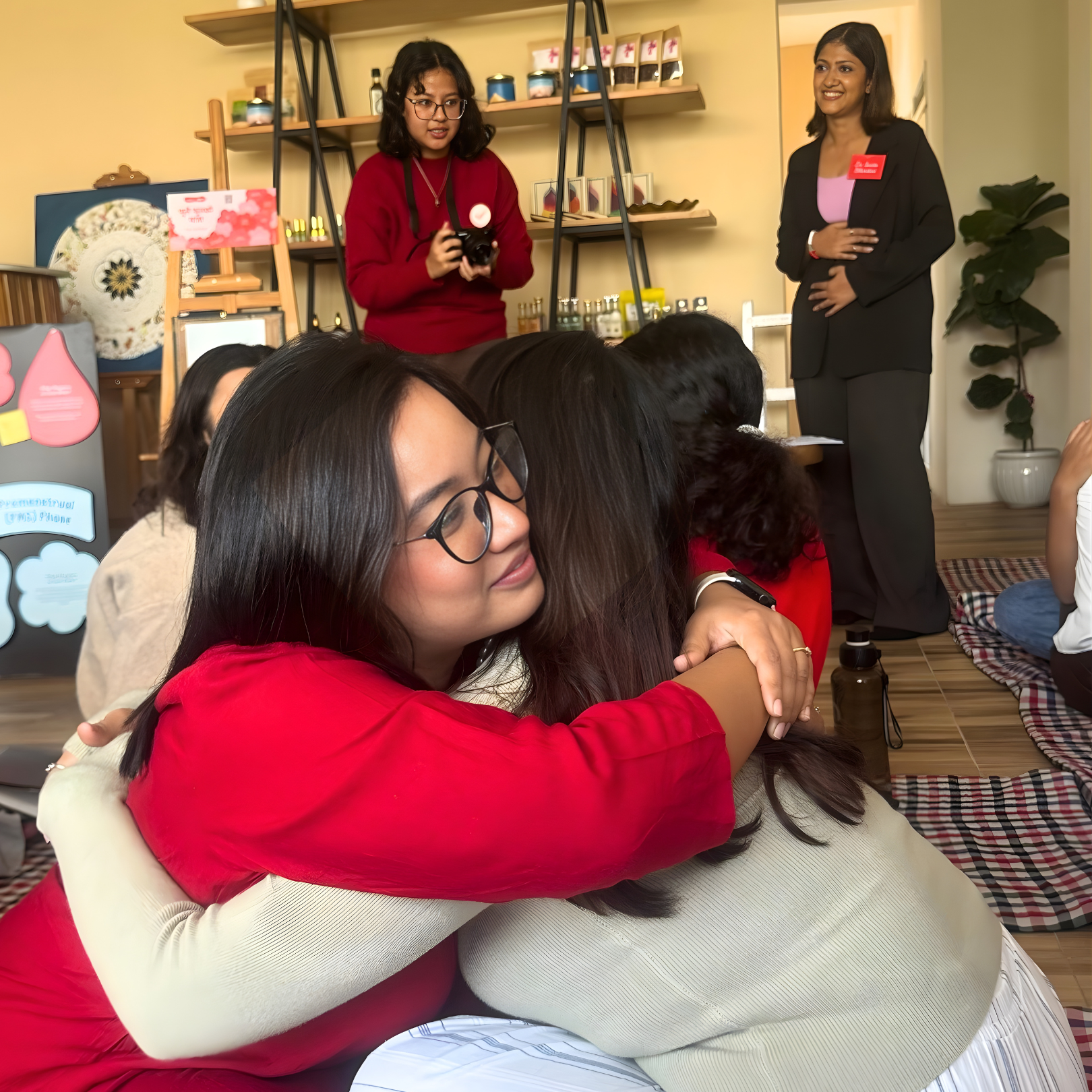 Women embracing in warm community connection